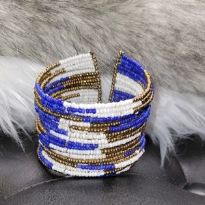 Stacked bead bracelet, blue, gold, white